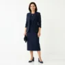 Woman in navy midi dress with structured blazer and block heels for conference keynote presentation