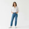 Collection of simple casual outfit ideas displayed on white backdrop with soft lighting